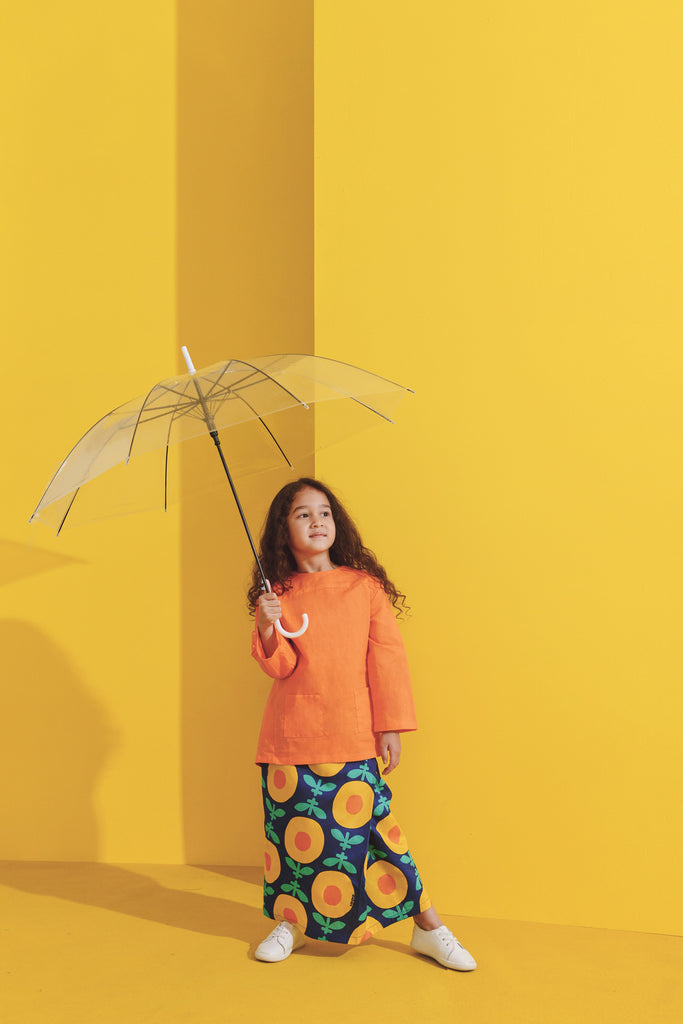 Folded Skirt with Orange Blouse