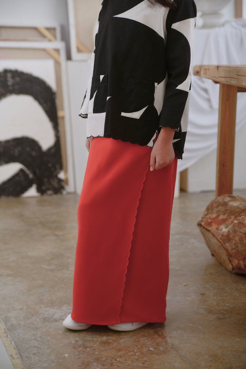 kain sulam merah batu bata budak