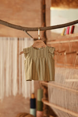 The Asal Kita Babies Kurung Pleats Top - Oat Grain