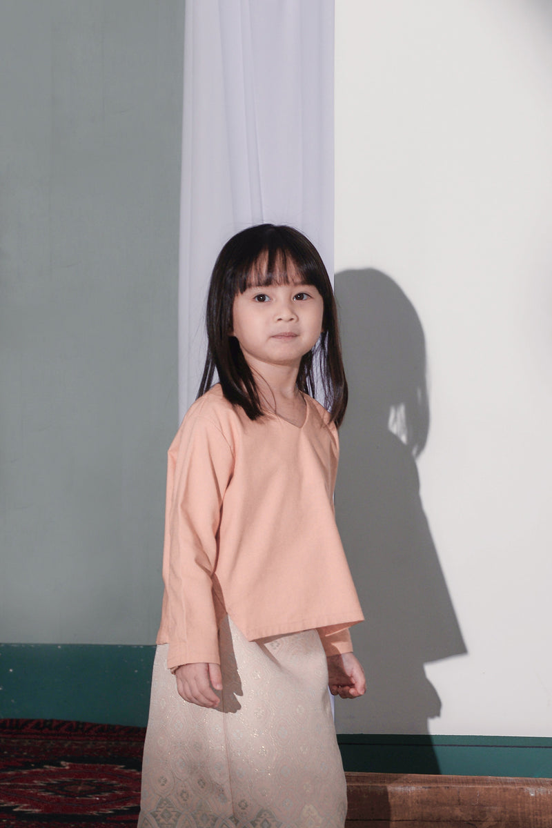 blouse budak pastel peach