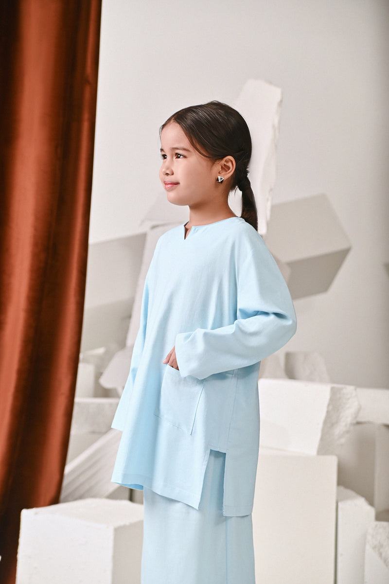 kurung pesak biru cair budak