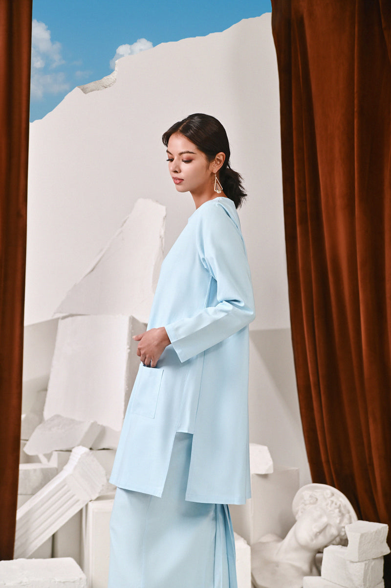 kurung pesak biru cair prempuan 