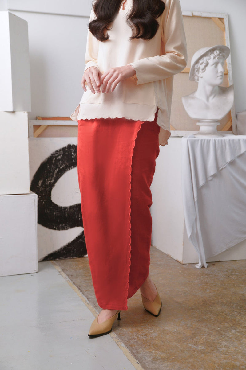 kain sulam merah batu bata perempuan 