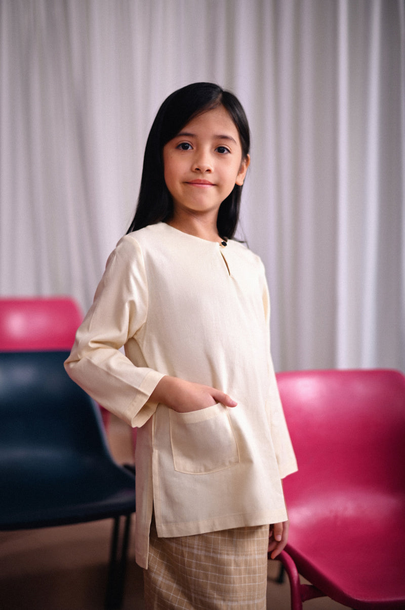 kurti pocket cream budak 