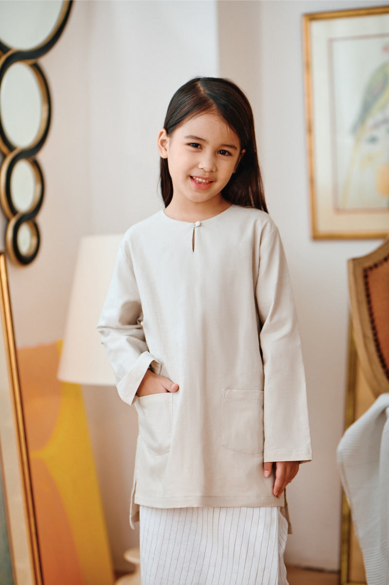 kurti pocket champagne budak 