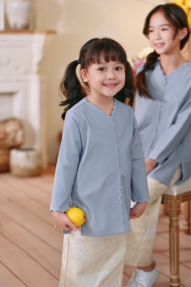 The Menuai Broderie Kurung Top - Light Pigeon Blue